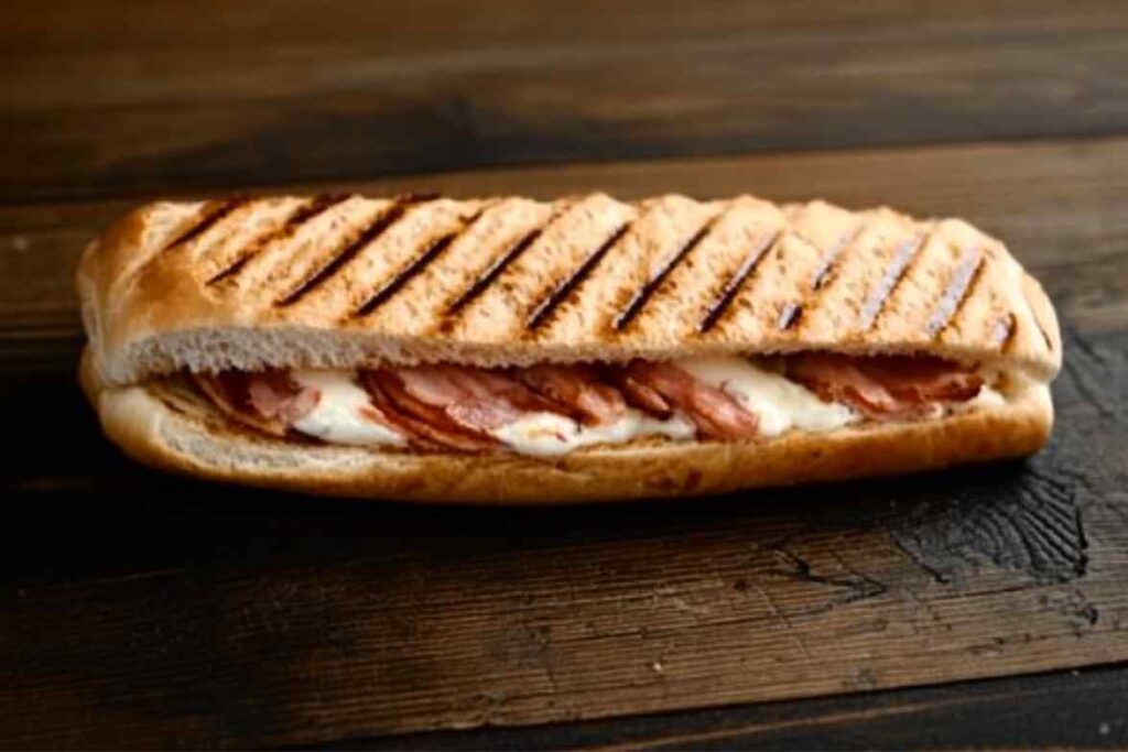 What is the secret to a good panini? Grilled panini sandwich with salami and cheese